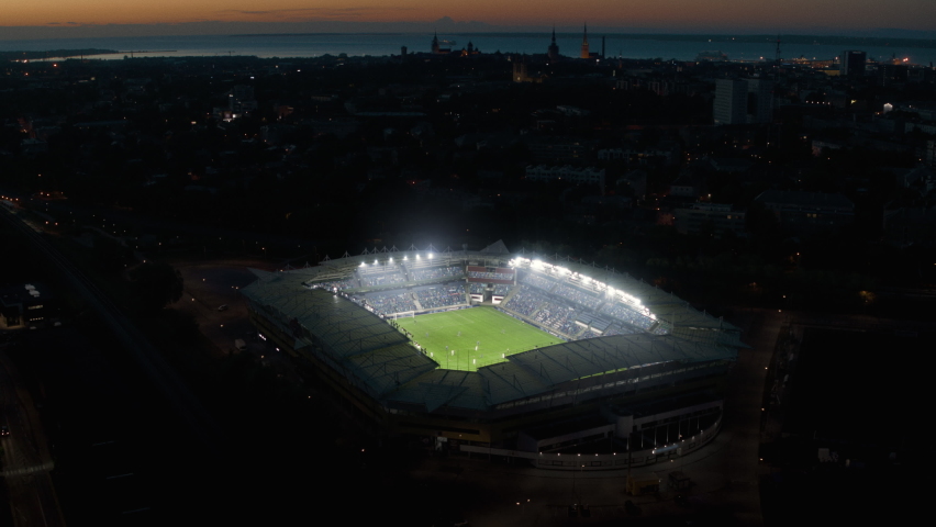 Aerial Establishing Shot of a Whole Stadium with Soccer Championship Match. Teams Play, Crowds of Fans Cheer. Football Tournament, Cup Broadcast. Sport Channel Television Playback, Screen Content Royalty-Free Stock Footage #1097032527