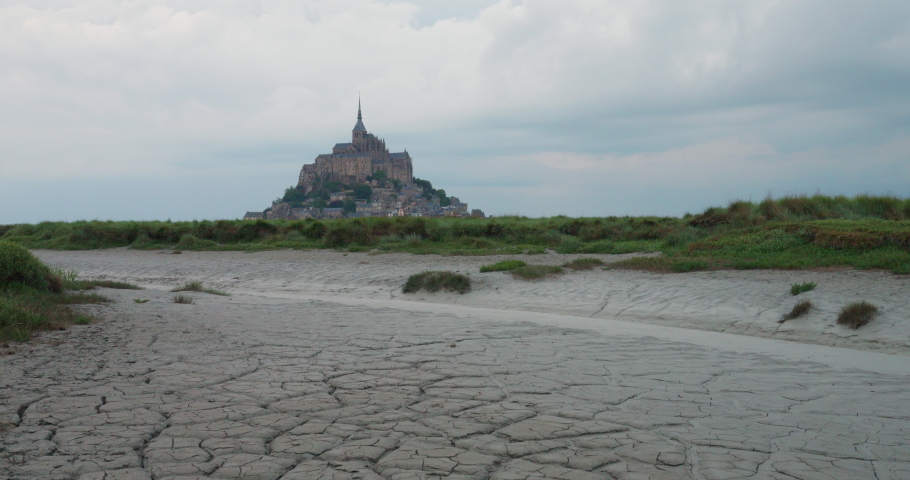 A Dried River Bed At The Abbey of Mont-Saint-Michel In Normandy, France. Wide Shot
