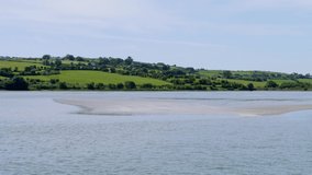 coast of the Atlantic Ocean in Ireland, coastal landscape. The Irish coast on a sunny day under a clear sky. Landscape.