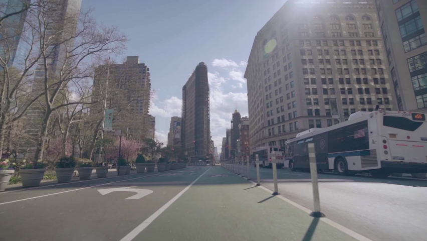 POV shot of empty streets of New York Manhattan during the Covid-19 coronavirus epidemic outbreak people with masks. Royalty-Free Stock Footage #1097050743