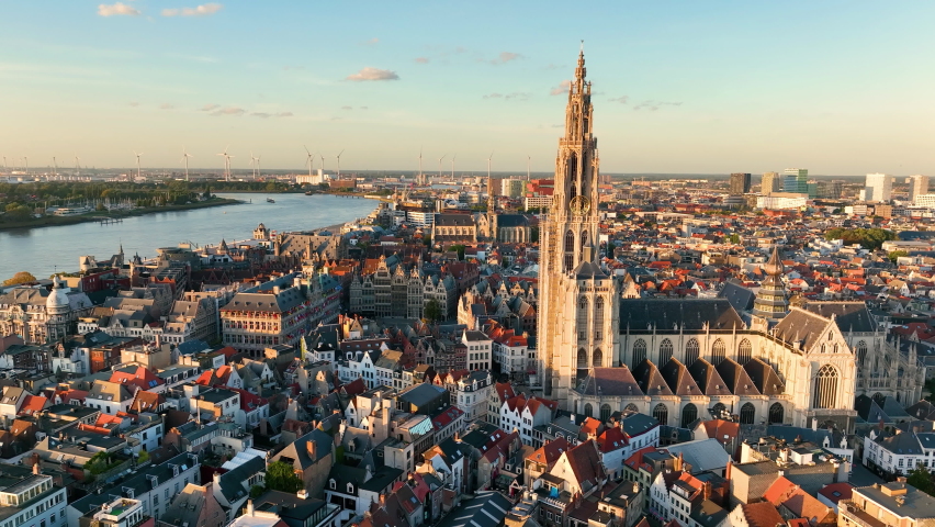 4K Aerial view of cityscape of Antwerp, gothic style landmark Cathedral of Our Lady Antwerp and historic center of city Belgium from above, Europe Royalty-Free Stock Footage #1097064093