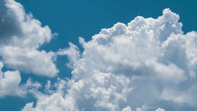 Timelapse of white puffy cumulus clouds forming on summer blue sky. Moving and changing cloudscape weather - Powered by Shutterstock - Get 15% off with code: PIKWIZARD15