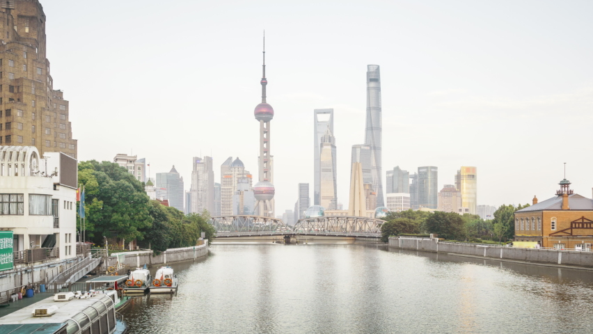 hyper lapse of sunset, Shanghai skyline and Waibaidu bridge, China Royalty-Free Stock Footage #1097071265