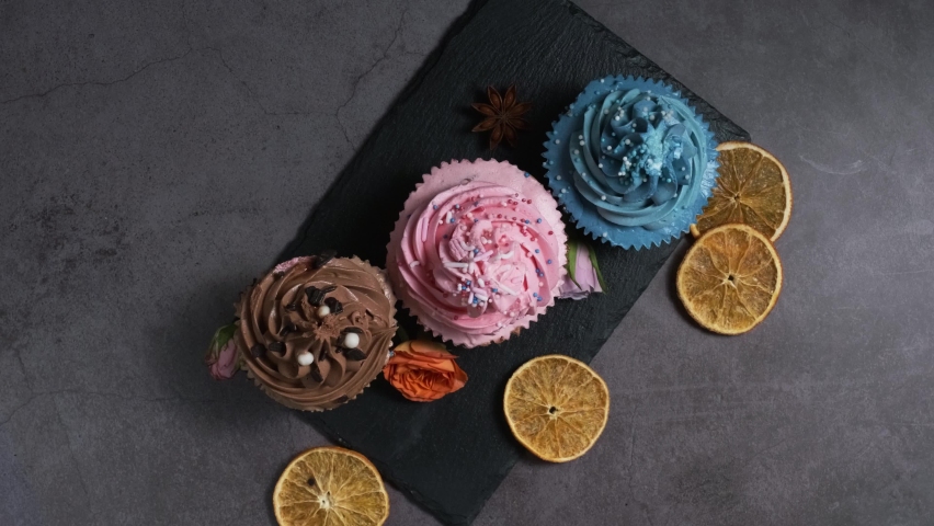 three different cakes on the table are taken at the same time