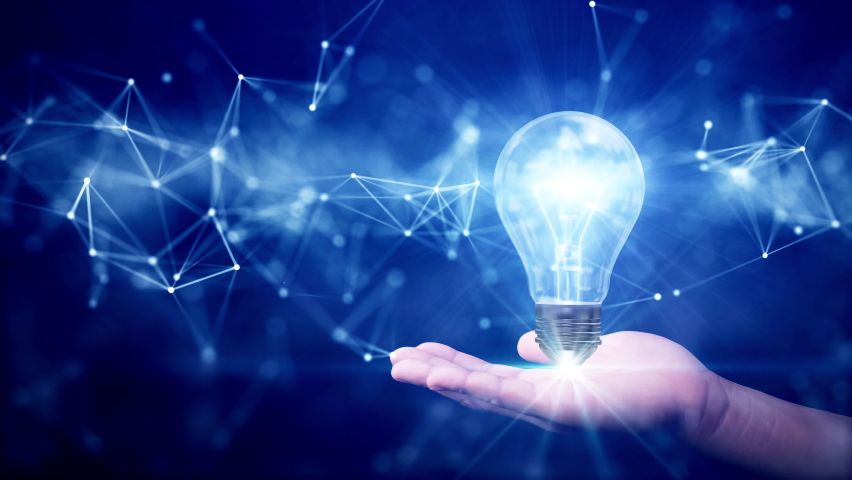 Business idea creative concept technology. Illuminated light bulb and connected polygons above hand on dark blue background. | Shutterstock HD Video #1097077635