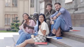 group of students giving a thumbs up . - Powered by Shutterstock - Get 15% off with code: PIKWIZARD15