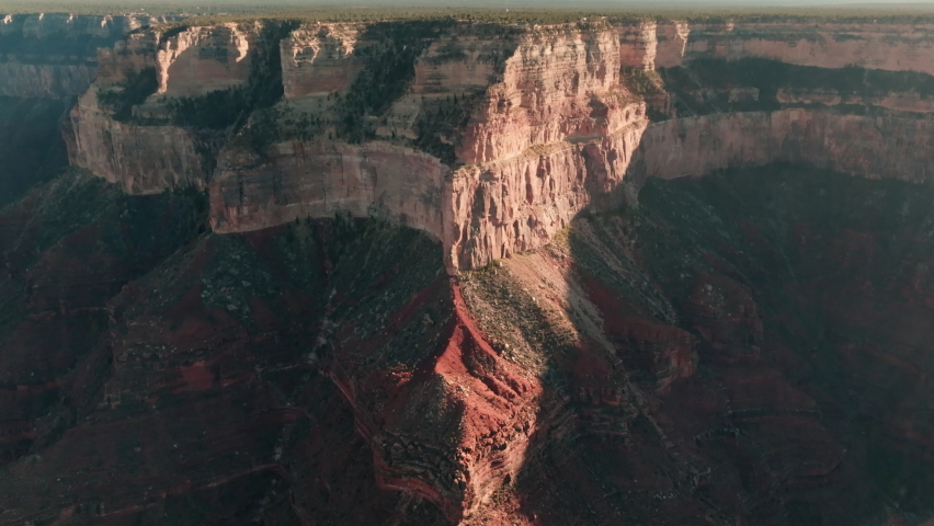 Aerial approach over deep gorge towards south rim of Grand Canyon.