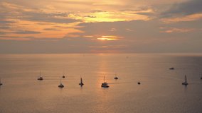Tourism yacht boat on the andaman sea at sunset in Phuket, south of Thailand, vacation concept