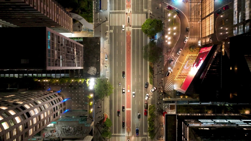 Sao Paulo Brazil. Top down view night Paulista Avenue at downtown Sao Paulo Brazil. Transportation scenery. Business office buildings. Cityscape Paulista Avenue at Sao Paulo Brazil. Royalty-Free Stock Footage #1097119759