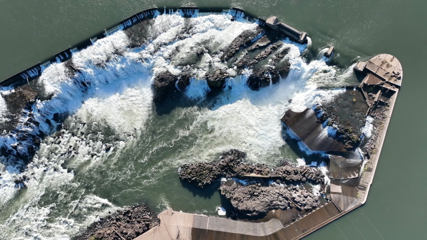 The Willamette Falls a natural waterfall between West Linn and Oregon City, not far south of Portland, Oregon. By volume, this is the largest waterfall in the Northwestern United States.