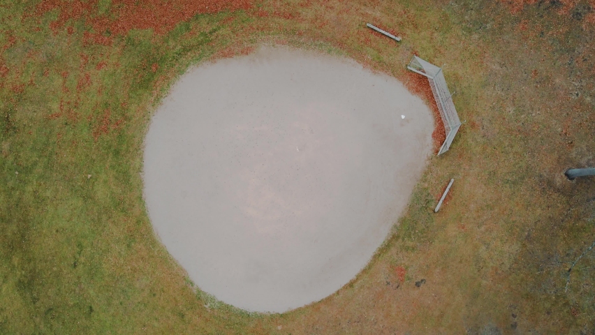 Aerial spin over a baseball mound at a local park.