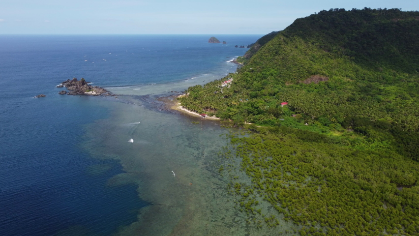 Aerial Shot Of Rock Formation And Beautiful Mangrove Shrubs, Baler, Aurora, Philippines. 4K Resolution