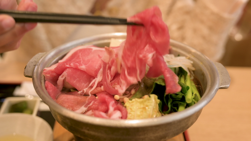 Tasty sukiyaki Japanese cuisine,Food concept,Sukiyaki (pork Hot Pot) Royalty-Free Stock Footage #1097147199