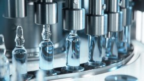 Close-up of Medical Ampoule Production Line at Modern Modern Pharmaceutical Factory. Glass Ampoules are being Filled. Medication Manufacturing Process. - Powered by Shutterstock - Get 15% off with code: PIKWIZARD15