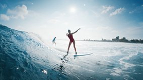 Surfing etiquette. Woman surfer drops in another girl on the wave and keeps riding - Powered by Shutterstock - Get 15% off with code: PIKWIZARD15