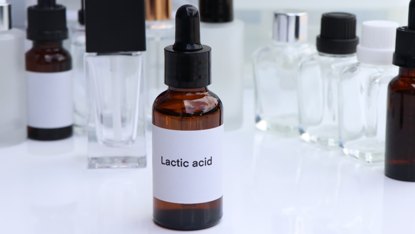 Lactic acid in a bottle, chemical ingredient in beauty product, skin care products | Shutterstock HD Video #1097186545