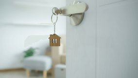 Close up house keychain in new apartment, condo or new house. move in new home. Buy or rent real estate. flat tenancy, leasehold property, new landlord, investment, dwelling, loan, mortgage, second. - Powered by Shutterstock - Get 15% off with code: PIKWIZARD15