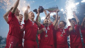 Football Finals Tournament Winning Team Celebrates Victory Cheering and Lifting Trophy Prize on Stadium. Happy Soccer Players Champions of International Championship Cup. Slow Motion Fireworks Shot - Powered by Shutterstock - Get 15% off with code: PIKWIZARD15