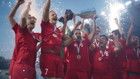 Football Finals Tournament Winning Team Celebrates Victory Cheering and Lifting Trophy Prize, Showing it to the Whole Stadium Arena. Happy Soccer Players Champions of International Championship Cup - Powered by Shutterstock - Get 15% off with code: PIKWIZARD15