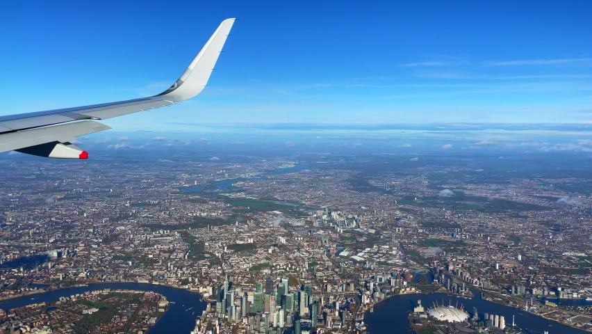 Grear window view in a flight over London City 30fps 4k Royalty-Free Stock Footage #1097200909