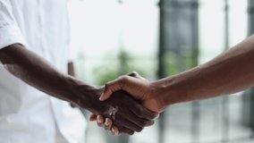 Businessman handshake for teamwork of business merger and acquisition,successful negotiate,hand shake, - Powered by Shutterstock - Get 15% off with code: PIKWIZARD15
