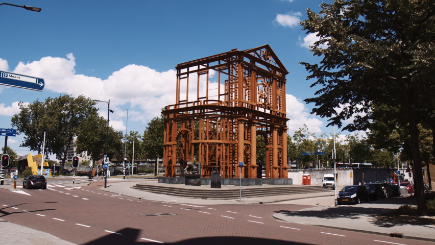 Slowmotion dolly shot of the Nieuwe Delftse Poort sculpture in Rotterdam, Netherlands