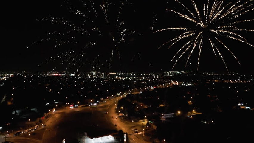 Shooting from a drone. A solemn royal salute against the background of the night sky. Fireworks for a holiday in the night city. | Shutterstock HD Video #1097229025