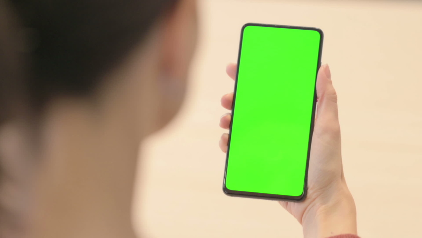 Close up of Female HandUsing Smartphone with Green Screen  | Shutterstock HD Video #1097231589