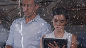 Animation of data processing over business people using electronic devices. Global business, finance, computing and data processing concept digitally generated video. - Powered by Shutterstock - Get 15% off with code: PIKWIZARD15