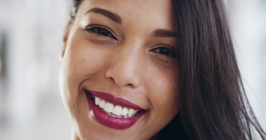 Woman, smile and portrait of a employee from India with happiness and healthy teeth. Happy Indian female face showing mouth hygiene, health and wellness closeup with makeup and cosmetic beauty | Shutterstock HD Video #1097235213
