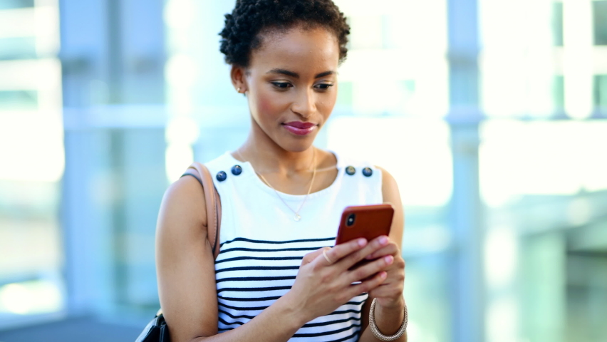 Black woman, smartphone conversation and happy social media communication with laughter, happiness and smiling. Funny African girl, cellphone texting and online cellular message with wifi connection | Shutterstock HD Video #1097235273