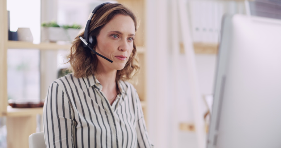 Crm, customer service and call center woman talking on a phone consultation with web support. Contact us, telemarketing and employee computer consultant call working on customer support sales | Shutterstock HD Video #1097235361