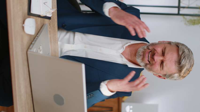 Businessman programmer software developer works, loses becoming surprised sudden lottery results, bad news, fortune loss fail at office workplace. Concentrated freelancer business gray-haired old man | Shutterstock HD Video #1097242615