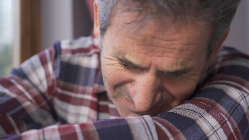 Depressed and lonely mature man cries and feels unwell.
Unhappy mature man crying.
 | Shutterstock HD Video #1097243111