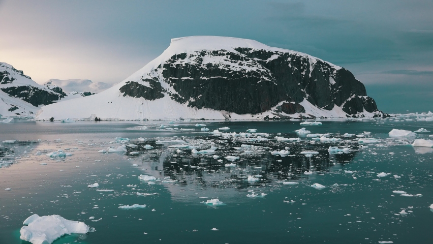 Icebergs. Climate Change and Global Warming. Icebergs from melting glacier in Anarctica. Antarctic nature ice landscape in Unesco World Heritage Site. Royalty-Free Stock Footage #1097248893