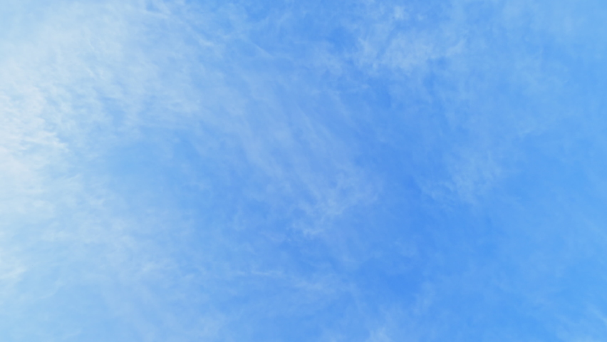 Clear sky. Dreamful mood. Tranquil mind. Clean blue heaven with light cloudy pattern of white clouds flying away. | Shutterstock HD Video #1097253535