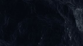 Aerial view of the dark ocean. Ripples and waves on deep water surface. 
Turbulent sea reflects the bright moonlight. Soft and relaxing movement. Night top view. Liquid background. - Powered by Shutterstock - Get 15% off with code: PIKWIZARD15