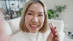 Influencer r adult asia woman people blogger live talk chat review lips swatch color on  reel   shop Vlogger happy side hustle fun reviewer blog vlog social media page app