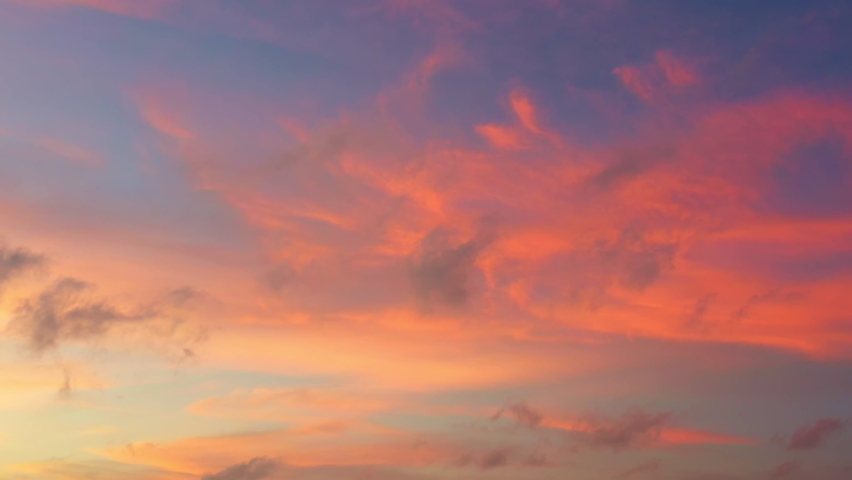 pink cloud in sky at sunset above the sea video 4K. Nature video High quality footage. 
Scene of Colorful romantic sky sunset with orange color of the sky background.
aerial view scenery sunset. Royalty-Free Stock Footage #1097261647