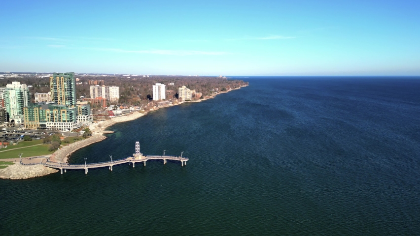 Aerial 4K video of coast and buildings in Burlington Ontario near Brant Street Pier