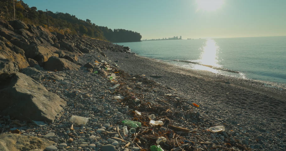 Garbage On Beach, Environmental Pollution. Empty Used Dirty Plastic Bottles. Rubbish On Beach. Tropical Beach Pollution. Ecological Problem. Beach Plastic Pollution. Enviroment Pollution Concept. | Shutterstock HD Video #1097270997