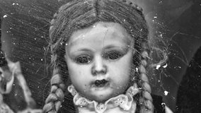 scary doll with white flashing scratches - Powered by Shutterstock - Get 15% off with code: PIKWIZARD15