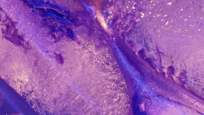 Creative paint art. Macro bokeh textured surface. Blue pink purple sparkling melting ice background | Shutterstock HD Video #1097289773