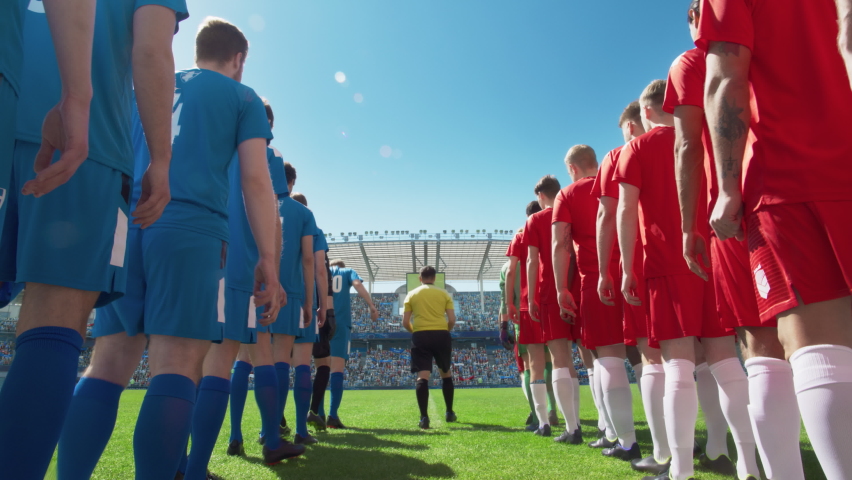 Football Championship Match, Crowds of Fans Cheer: Two Professional Soccer Teams Enter Stadium Where they Will Compete for Champion Status. Start of the Major League International Cup Tournament Royalty-Free Stock Footage #1097291259