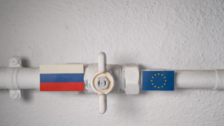 Hand opening a gas valve on a home pipeline symbolizing the end of energy cut-off from Russia to the European Union. Royalty-Free Stock Footage #1097299575