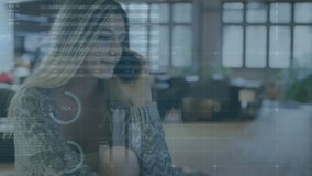 Animation of data processing and stars over caucasian woman talking on smartphone. Global business and digital interface concept digitally generated video. - Powered by Shutterstock - Get 15% off with code: PIKWIZARD15
