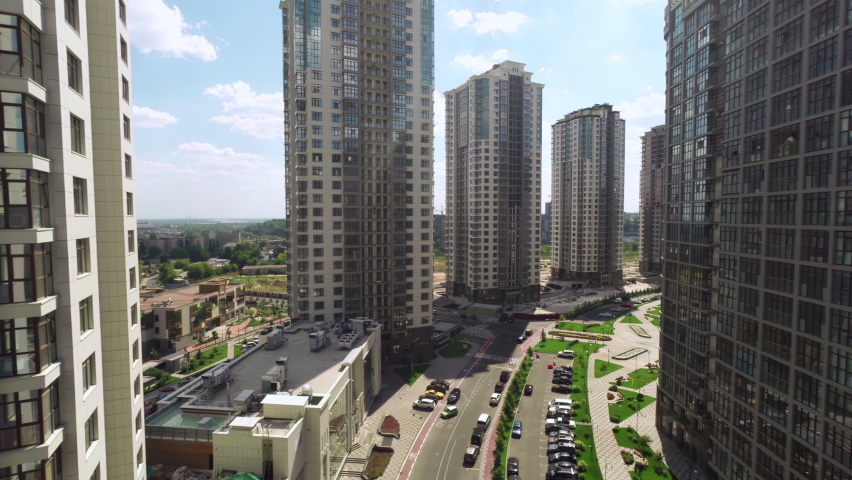 Elite Luxury Real Estate Residential Area. Flying Over in between Tall Buildings