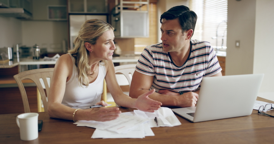 Couple, laptop and fight while planning debt payment online, budget documents and saving stress or insurance finance. Man, woman angry and financial mortgage or expenses payment on computer, | Shutterstock HD Video #1097324783