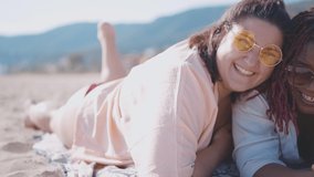 Cinematic storytelling footage of beautiful plus size women having fun at the beach in the summertime. Oversized big girls friends, representation of body positivity and body acceptance concepts - Powered by Shutterstock - Get 15% off with code: PIKWIZARD15