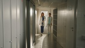 Two colleagues of doctors in the locker room after work. Teamwork in a modern hospital - Powered by Shutterstock - Get 15% off with code: PIKWIZARD15